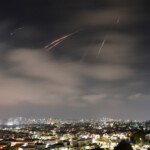 Missiles launched from Iran are intercepted, as seen from the city of Ashkelon, Israel, June 13, 2025. REUTERS/Amir Cohen