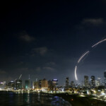 Missiles launched from Iran are intercepted as seen from Tel Aviv, Israel June 13, 2025. REUTERS/Jamal Awad