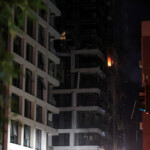 Fire burns in a building at an impact site following a missile attack from Iran on Israel, at Tel Aviv, Israel, June 13, 2025 REUTERS/Itai Ron