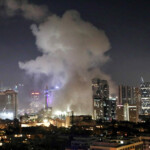 Smoke billows following missile attack from Iran on Israel, at Tel Aviv, Israel June 13, 2025 REUTERS/Gideon Markowicz
