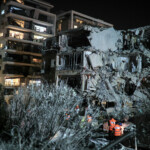 Rescue and security personnel work at an impact site following missile attack from Iran on Israel, in Ramat Gan, Israel June 13, 2025 REUTERS/Itai Ron