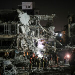 Rescue and security personnel work at an impact site following missile attack from Iran on Israel, in Ramat Gan, Israel June 13, 2025 REUTERS/Itai Ron