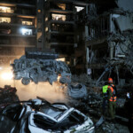 Rescue and security personnel work at an impact site following missile attack from Iran on Israel, at Ramat Gan June 13, 2025 REUTERS/Itai Ron