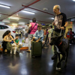 People take cover in public shelter following missile attack from Iran on Israel, at Tel Aviv, Israel June 13, 2025 REUTERS/Itay Cohen