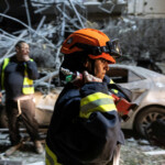Rescue personnel work at an impact site following missile attack from Iran on Israel, in Ramat Gan, Israel June 13, 2025 REUTERS/Itay Cohen