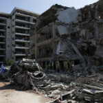 A view of damaged buildings at an impact site following missile attack from Iran on Israel, in Ramat Gan, Israel, June 14, 2025. REUTERS/Ronen Zvulun