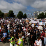 People participate in the "No Kings" rally near the Georgia State Capitol in Atlanta, Georgia, U.S., June 14, 2025. REUTERS/Alyssa Pointer