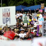 People participate in the "No Kings" rally near the Georgia State Capitol in Atlanta, Georgia, U.S., June 14, 2025. REUTERS/Alyssa Pointer