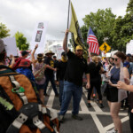A group of Proud Boys attend the "No Kings" rally near the Georgia State Capitol in Atlanta, Georgia, U.S., June 14, 2025. REUTERS/Alyssa Pointer