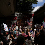 People participate in the "No Kings" rally in Atlanta, Georgia, U.S., June 14, 2025. REUTERS/Alyssa Pointer