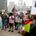 People participate in the "No Kings" protest in Philadelphia, Pennsylvania, U.S., June 14, 2025. REUTERS/Rachel Wisniewski