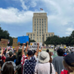 People gather outside Houston city hall for "No Kings" rally, in Houston, Texas, U.S. June 14, 2025. REUTERS/Arathy Somasekhar