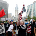 People participate in the "No Kings" protest in Philadelphia, Pennsylvania, U.S., June 14, 2025. REUTERS/Rachel Wisniewski