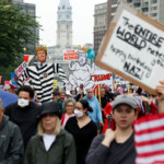 People participate in the "No Kings" protest in Philadelphia, Pennsylvania, U.S., June 14, 2025. REUTERS/Rachel Wisniewski