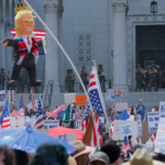 LA County Sheriffs stand guard as demonstrators attend a "No Kings Day" protest outside City Hall, in downtown Los Angeles, California, U.S., June 14, 2025. REUTERS/MIKE BLAKE