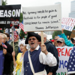 People participate in the "No Kings" protest against President Donald Trump's policies in Philadelphia, Pennsylvania, U.S., June 14, 2025. REUTERS/Rachel Wisniewski