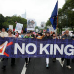 People participate in the "No Kings" protest against President Donald Trump's policies in Philadelphia, Pennsylvania, U.S., June 14, 2025. REUTERS/Rachel Wisniewski