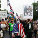 People participate in the "No Kings" protest against President Donald Trump's policies in Philadelphia, Pennsylvania, U.S., June 14, 2025. REUTERS/Rachel Wisniewski