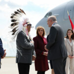 Australian Prime Minister Anthony Albanese is greeted by Bearspaw First Nation Councillor Rod Hunter as he arrives before world leaders meet in Kananaskis for the G7 leaders' summit, at Calgary International Airport in Calgary, Alberta, Canada June 15, 2025. REUTERS/Amber Bracken/Pool