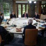 G7 leaders and guests attend a meeting, at the G7 summit in Kananaskis, Alberta, Canada, June 16, 2025. REUTERS/Kevin Lamarque