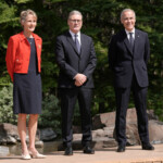 Britain's Prime Minister Keir Starmer poses for a photo with Diana Fox Carney and Prime Minister of Canada Mark Carney, as he arrives at the G7 leaders' summit in Kananaskis, Alberta, Canada June 16, 2025. Stefan Rousseau/Pool via REUTERS