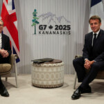 British Prime Minister Keir Starmer and France's President Emmanuel Macron attend a bilateral meeting at the G7 summit, in Kananaskis, Alberta, Canada, June 16, 2025. REUTERS/Suzanne Plunkett/Pool