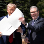 U.S. President Donald Trump and British Prime Minister Keir Starmer hold a signed Trade Agreement during a meeting, at the G7 summit, in Kananaskis, Alberta, Canada June 16, 2025. Stefan Rousseau/Pool via REUTERS