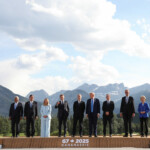 European Council President Antonio Costa, Japan's Prime Minister Shigeru Ishiba, Italian Prime Minister Giorgia Meloni, French President Emmanuel Macron, Canada Prime Minister Mark Carney, U.S. President Donald Trump, British Prime Minister Keir Starmer, German Chancellor Friedrich Merz and European Commission President Ursula von der Leyen pose for a family photo during the G7 Summit in Kananaskis, Alberta, Canada, June 16, 2025. REUTERS/Amber Bracken