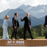 Japan's Prime Minister Shigeru Ishiba, Italy's Prime Minister Giorgia Meloni, France's President Emmanuel Macron, Canada Prime Minister Mark Carney and U.S. President Donald Trump walk after posing for a family photo during the G7 Summit in Kananaskis, Alberta, Canada, June 16, 2025. REUTERS/Amber Bracken