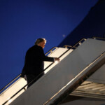 U.S. President Donald Trump boards Air Force One as he departs early from the G7 Leaders' Summit in the Rocky Mountain resort town of Kananaskis to return to Washington, at Calgary International Airport in Calgary, Alberta, Canada, June 16, 2025. REUTERS/Kevin Lamarque
