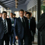 French President Emmanuel Macron and Japanese Prime Minister Shigeru Ishiba arrive for G7, Ukraine and NATO Working Breakfast Session V, during the G7 Leaders' Summit in Kananaskis, in Alberta, Canada, June 17, 2025. REUTERS/Amber Bracken