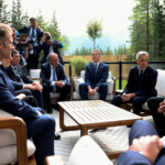 Canadian Prime Minister Mark Carney, Ukrainian President Volodymyr Zelenskiy, U.S. Treasury Secretary Scott Bessent, German Chancellor Friedrich Merz, Japanese Prime Minister Shigeru Ishiba and French President Emmanuel Macron meet during the G7 Leaders' Summit in Kananaskis, in Alberta, Canada, June 17, 2025. REUTERS/Suzanne Plunkett/Pool