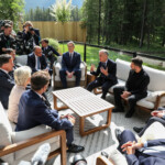 U.S. Treasury Secretary Scott Bessent, Canadian Prime Minister Mark Carney, Ukraine's President Volodymyr Zelenskiy, British Prime Minister Keir Starmer, European Council President Antonio Costa, French President Emmanuel Macron, European Commission President Ursula von der Leyen, NATO Secretary General Mark Rutte, Japanese Prime Minister Shigeru and German Chancellor Friedrich Merz attend the G7, Ukraine and NATO Working Breakfast Session V, during the G7 Leaders' Summit in Kananaskis, in Alberta, Canada, June 17, 2025. REUTERS/Amber Bracken