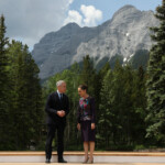 Canadian Prime Minister Mark Carney and Mexico's President Claudia Sheibaum stand together on the stage ahead of a family photo during the G7 Leaders' Summit in Kananaskis, in Alberta, Canada, June 17, 2025. REUTERS/Amber Bracken