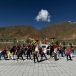 The first batch of ‘Kailash Manasarovar Yatra’ Yatris via Nathu La route, performed Yoga to mark the International Day of Yoga 2025 in Bainang County in Tibet