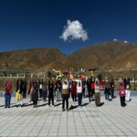 The first batch of ‘Kailash Manasarovar Yatra’ Yatris via Nathu La route, performed Yoga to mark the International Day of Yoga 2025 in Bainang County in Tibet