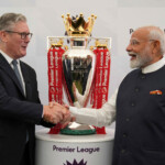 Britain's Prime Minister Keir Starmer and Prime Minister Narendra Modi of India, shake hands in front of a Premier League trophy during a business showcase event at Chequers near Aylesbury, England, Thursday, July 24, 2025. Kin Cheung/Pool via REUTERS
