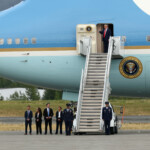 U.S. President Donald Trump disembarks Air Force One, as he arrives at Joint Base Elmendorf-Richardson, ahead of a meeting with Russian President Vladimir Putin to negotiate for an end to the war in Ukraine, in Anchorage, Alaska, U.S., August 15, 2025. REUTERS/Kevin Lamarque