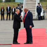 U.S. President Donald Trump shakes hand with Russian President Vladimir Putin, as they meet to negotiate for an end to the war in Ukraine, at Joint Base Elmendorf-Richardson in Anchorage, Alaska, U.S., August 15, 2025. REUTERS/Kevin Lamarque