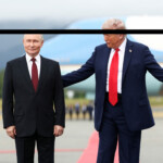 U.S. President Donald Trump stands with Russian President Vladimir Putin, as they meet to negotiate for an end to the war in Ukraine, at Joint Base Elmendorf-Richardson in Anchorage, Alaska, U.S., August 15, 2025. REUTERS/Kevin Lamarque