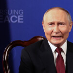 Russian President Vladimir Putin speaks as he attends a meeting with U.S. President Donald Trump (not pictured), to discuss an end to the war in Ukraine, in Anchorage, Alaska, U.S., August 15, 2025. REUTERS/Kevin Lamarque