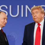 U.S. President Donald Trump and Russian President Vladimir Putin shake hands during a press conference following their meeting to negotiate an end to the war in Ukraine, at Joint Base Elmendorf-Richardson, in Anchorage, Alaska, U.S., August 15, 2025. REUTERS/Kevin Lamarque