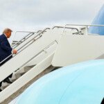 U.S. President Donald Trump boards Air Force One as he departs following his meeting with Russian President Vladimir Putin to negotiate an end to the war in Ukraine, at Joint Base Elmendorf-Richardson, Alaska, U.S., August 15, 2025. REUTERS/Kevin Lamarque