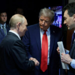 Russian President Vladimir Putin shakes hands with U.S. President Donald Trump after a joint news conference following their meeting at Joint Base Elmendorf-Richardson in Anchorage, Alaska, U.S., August 15, 2025. Sputnik/Gavriil Grigorov/Pool via REUTERS