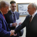 U.S. President Donald Trump shakes hands with Russian President Vladimir Putin before a joint news conference following their meeting at Joint Base Elmendorf-Richardson in Anchorage, Alaska, U.S., August 15, 2025. Sputnik/Gavriil Grigorov/Pool via REUTERS