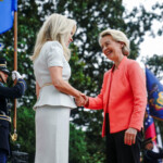 U.S. Chief of Protocol Monica Crowley greets European Commission's President Ursula von der Leyen as she arrives at the White House amid negotiations to end the Russian war in Ukraine, in Washington, D.C., U.S., August 18, 2025. REUTERS/Nathan Howard