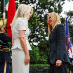 U.S. Chief of Protocol Monica Crowley greets Italy's Prime Minister Giorgia Meloni as she arrives at the White House amid negotiations to end the Russian war in Ukraine, in Washington, D.C., U.S., August 18, 2025. REUTERS/Nathan Howard