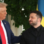 U.S. President Donald Trump greets Ukrainian President Volodymyr Zelenskiy at the White House, amid negotiations to end the Russian war in Ukraine, in Washington, D.C., U.S., August 18, 2025. REUTERS/Kevin Lamarque