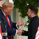 U.S. President Donald Trump shakes hands with Ukrainian President Volodymyr Zelenskiy at the White House, amid negotiations to end the Russian war in Ukraine, in Washington, D.C., U.S., August 18, 2025. REUTERS/Kevin Lamarque