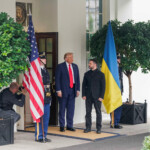 U.S. President Donald Trump meets with Ukrainian President Volodymyr Zelenskiy as he arrives at the White House amid negotiations to end the Russian war in Ukraine, in Washington, D.C., U.S., August 18, 2025. REUTERS/Nathan Howard